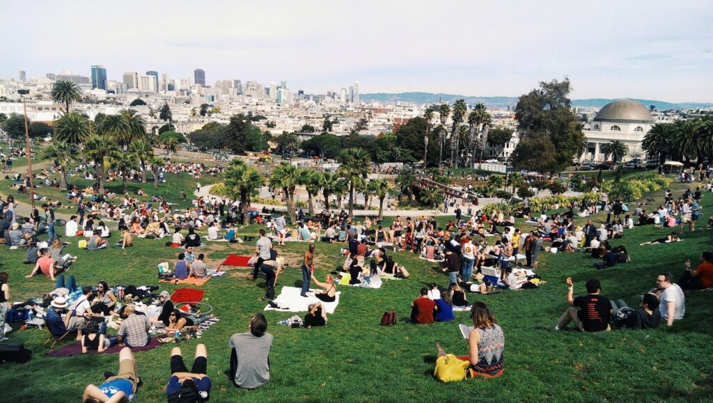 People enjoying nice weather in Dolores Park in San Francisco